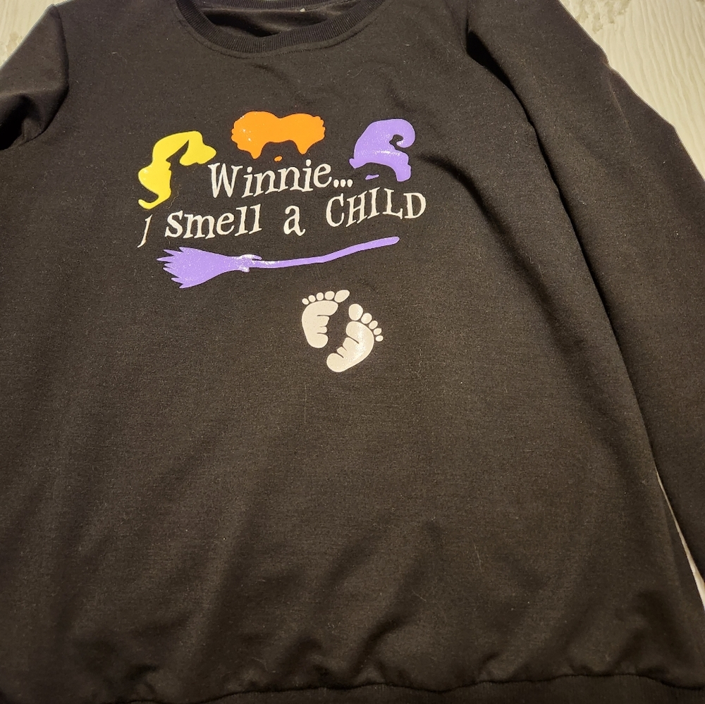 A size XL maternity sweatshirt it's thin, not a thick sweatshirt.
